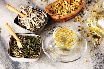 tea with Chamomile, sage and stinging nettle tea. Dried chamomile tea on table
