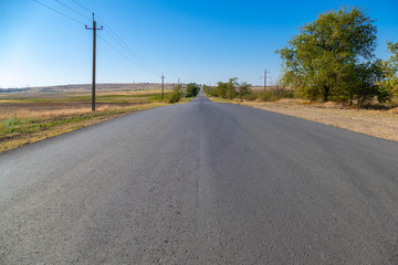 Empty road. Paved highway without cars in the countryside, close up