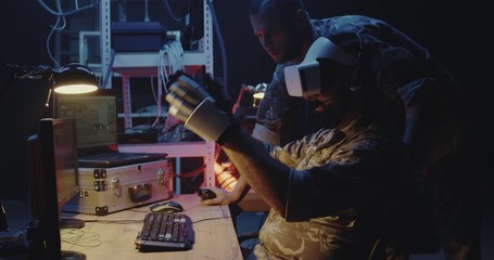 Soldiers using VR headsets and gloves