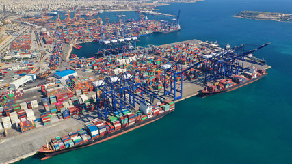 Aerial drone photo of industrial cargo container terminal in commercial port of Piraeus, Attica, Greece - obrazy, fototapety, plakaty