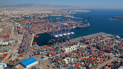 Aerial drone photo of industrial cargo container terminal in commercial port of Piraeus, Attica, Greece