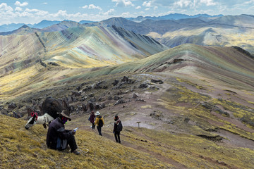 Stunning view at Palccoyo rainbow mountain (Vinicunca alternative), mineral colorful stripes in Andean valley, Cusco, Peru, South America