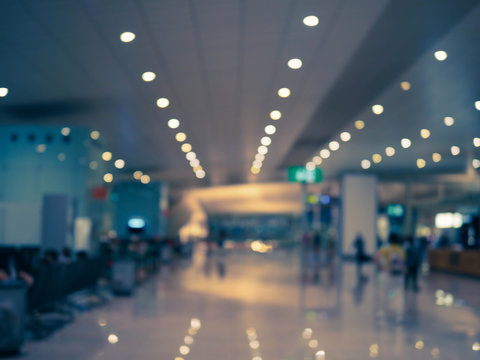 Blurry Image Of People In The Airport .