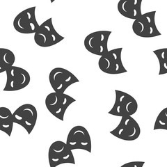 Vector Image Theatrical face mask. Drama and comedy icon seamless pattern on a white background.