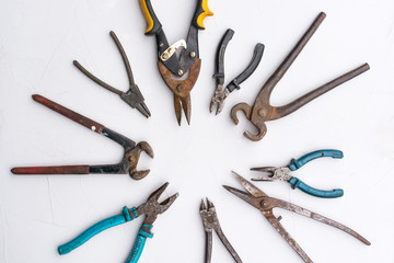 Old rusty hand tools closeup.