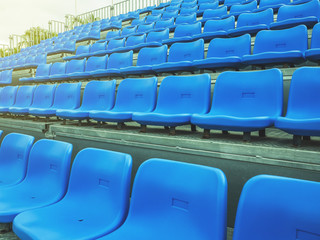 Fototapeta premium Blue chair on the grandstand