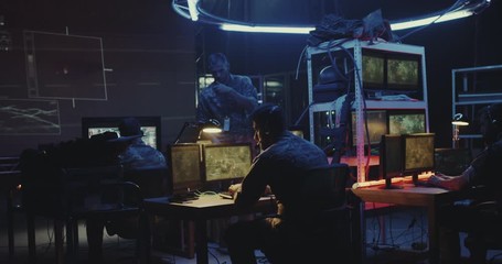 Soldier working on a computer