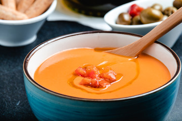 bowl with salmorejo, a typical spanish tomato soup similar to the gazpacho
