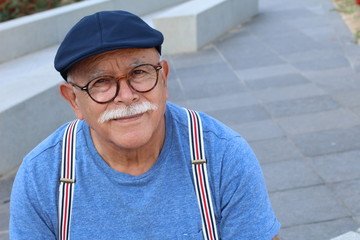 Senior retired man looking at camera 