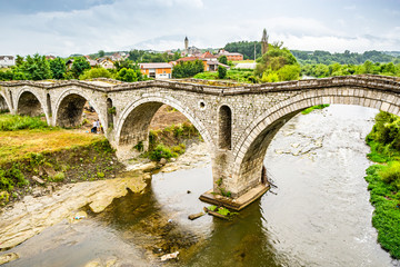 Fototapeta premium Old ottoman Terzijski Bridge over river Erenik near village Bistrazin in Kosovo