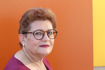 Ethnic grandmother looking at camera