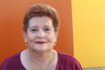  Senior retired woman looking at camera 