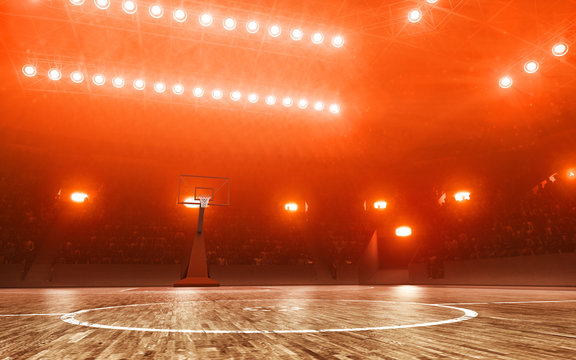 Empty basketball arena with basketball rim. Red floodlit background