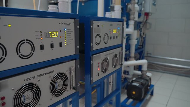 Automated ozone generator for ozonation of pure drinking water in water production factory
