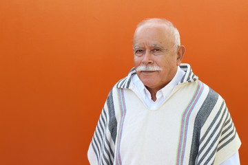 Senior Hispanic man with traditional clothing