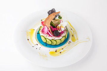 Luxury Shrimp salad with vegetables, fruits and berries. Banquet festive dishes. Gourmet restaurant menu. White background.