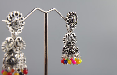 Pair of black metal earring with beads