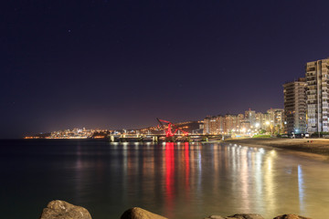 Obraz premium View of Muelle Vergara at night in Viña del Mar, Chile
