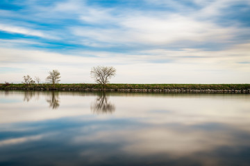 landscape with lake and blue sky