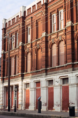 Vertical: Early morning light on historic downtown buildings in Galveston Island, Texas