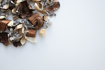 Flowers composition. Frame made of dried rose flowers on white background. Flat lay, top view, copy space