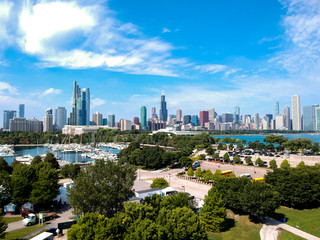Chicago,IL/USA-September 18 2019: aerial drone footage of the city of Chicago downtown skyscraper landscape during high-noon. the sky's are clear blue as the building have a colorful vibrancy 