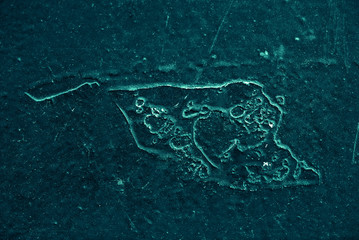 Vintage azure background. Rough painted wall of turquoise color. Imperfect plane of cyan colored. Uneven old decorative toned backdrop of aqzure tint. Texture of teal hue. Ornamental stony surface.