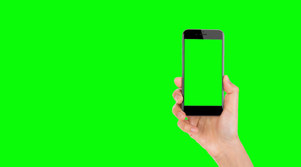 hand holding smart phone with green screen 
