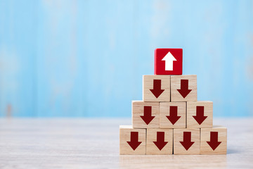 Red block with different direction of arrow on table background. Business Growth, Improvement, strategy, Successful, different and Unique Concepts