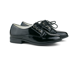 Black patent leather shoes with tied laces izolirovannye on a white background.