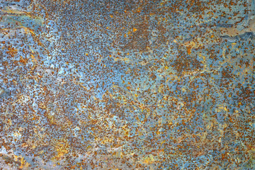 Abstract grunge rustic background. Colorful rusty background. Selective focus