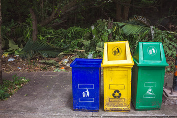 Old trash cans along the way with nature