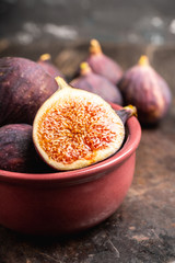 Fresh ripe figs on the rustic background. Selective focus. Shallow depth of field.