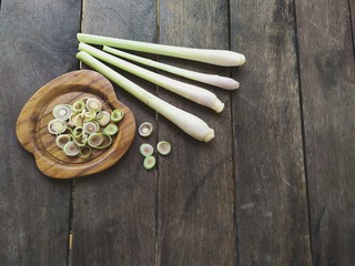 lemongrass or cymbopogon citratus on wood background design concept in rustic