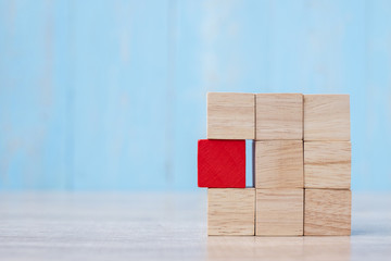Red wooden block on the building. Business planning, Risk Management, Solution, strategy, different and Unique Concepts