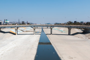  The Tijuana River canal, which often serves as the location of homeless encampments of individuals deported from the United States.