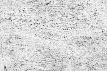 white and gray textured plaster on the wall