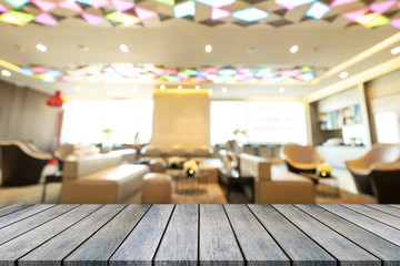 Perspective empty wooden table on top over blur background, can be used mock up for montage products display or design layout.