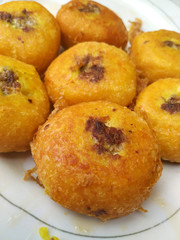 Potato patties stuffed with beef. Rustic style. Close Up