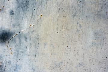 Metal texture with scratches and cracks which can be used as a background