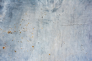 Metal texture with scratches and cracks which can be used as a background