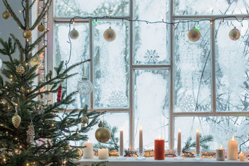 Christmas decorations on old wooden window