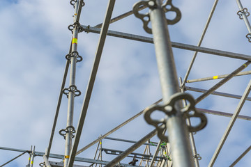 Metal girder extensive scaffolding providing platforms for stage structure support