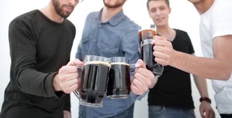 guys with mugs of beer isolated on white background