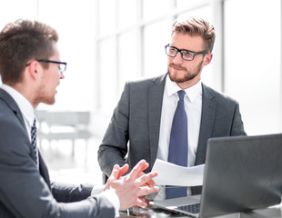 business partners discussing business document.