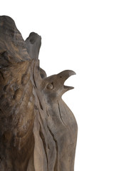 Carved sculpture of bog oak on a white background.