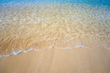 beautiful sandy beach and soft blue ocean wave