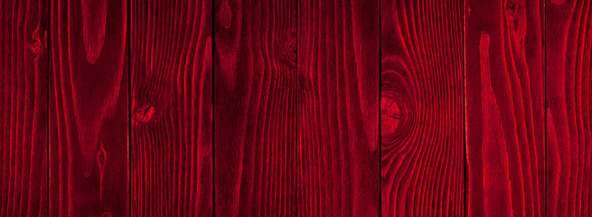 Red wood texture. Background old red panels.