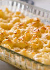 Сauliflower casserole in cheese sauce  in a glass baking dish