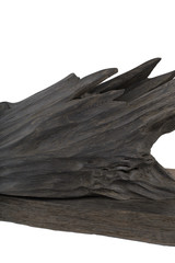 Carved sculpture of bog oak on a white background.
